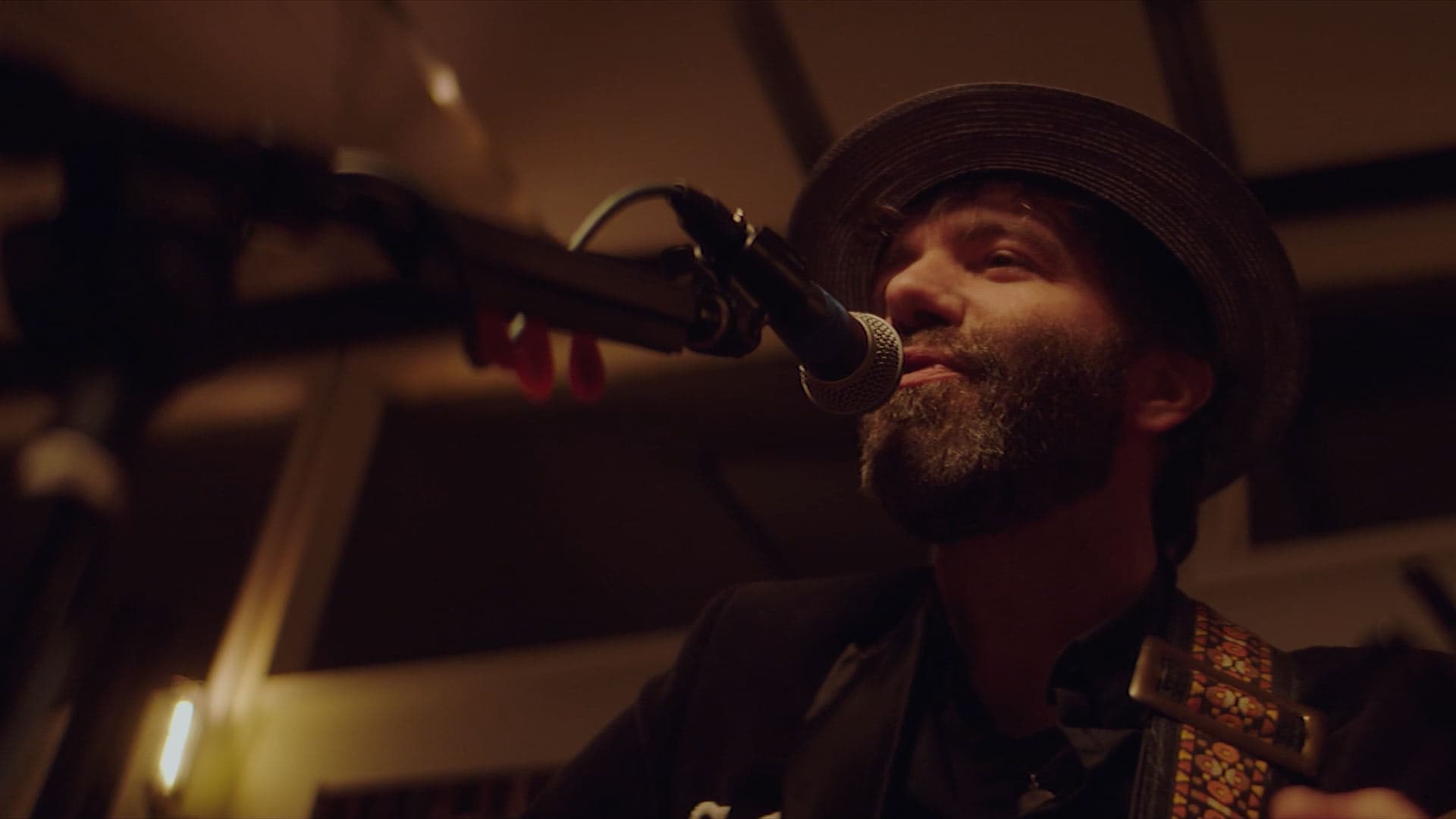 A man singing into a microphone