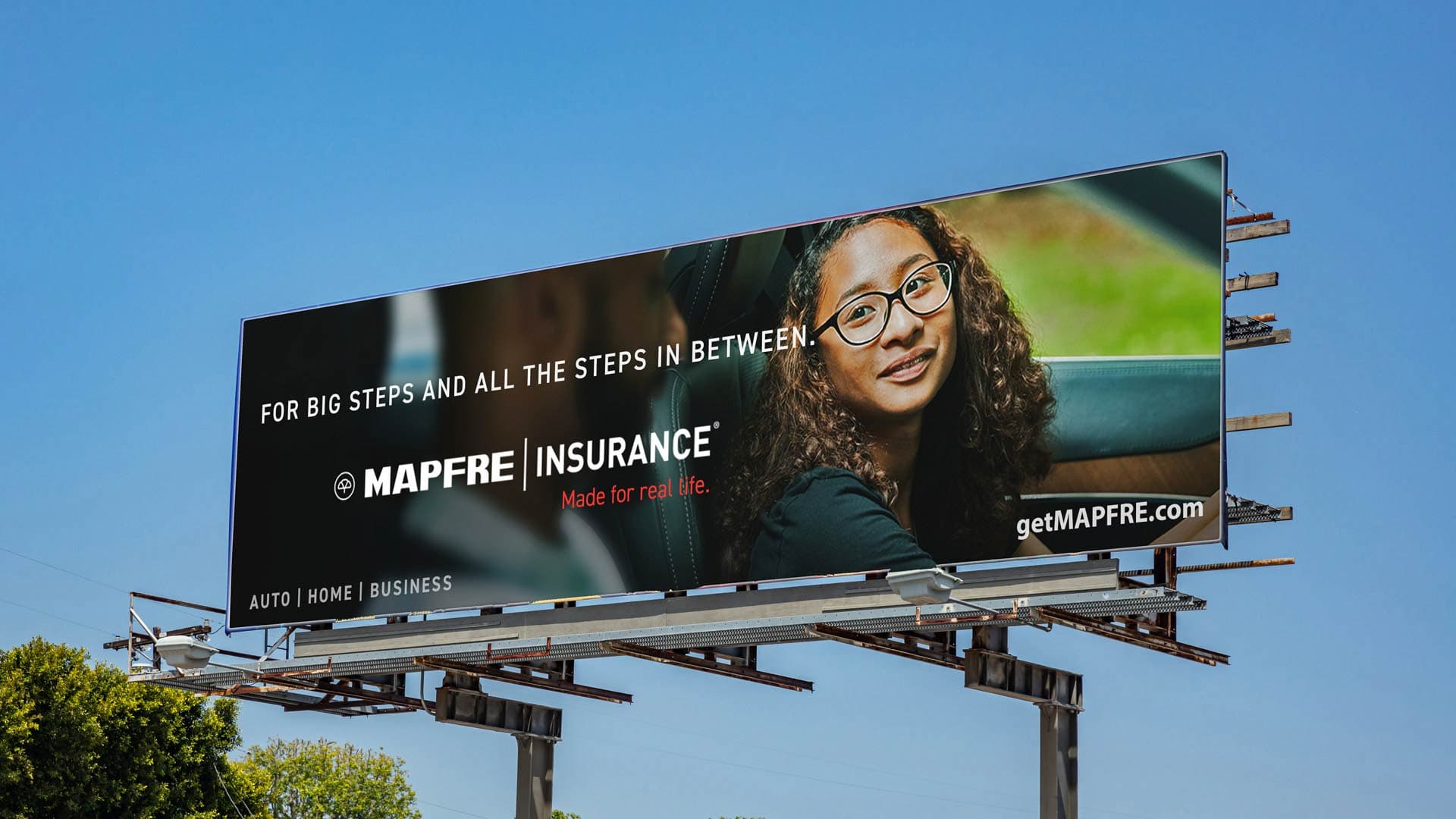 A Mapfre Insurance billboard OOH showing outside.