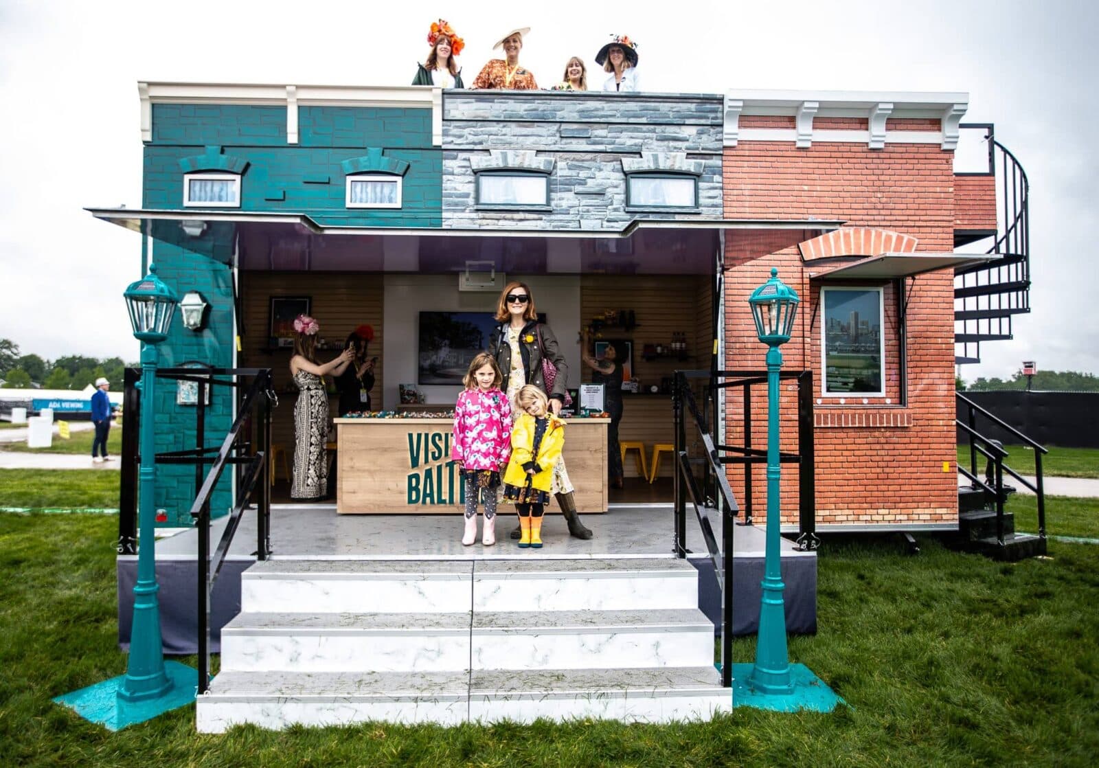 People smiling inside the trailer