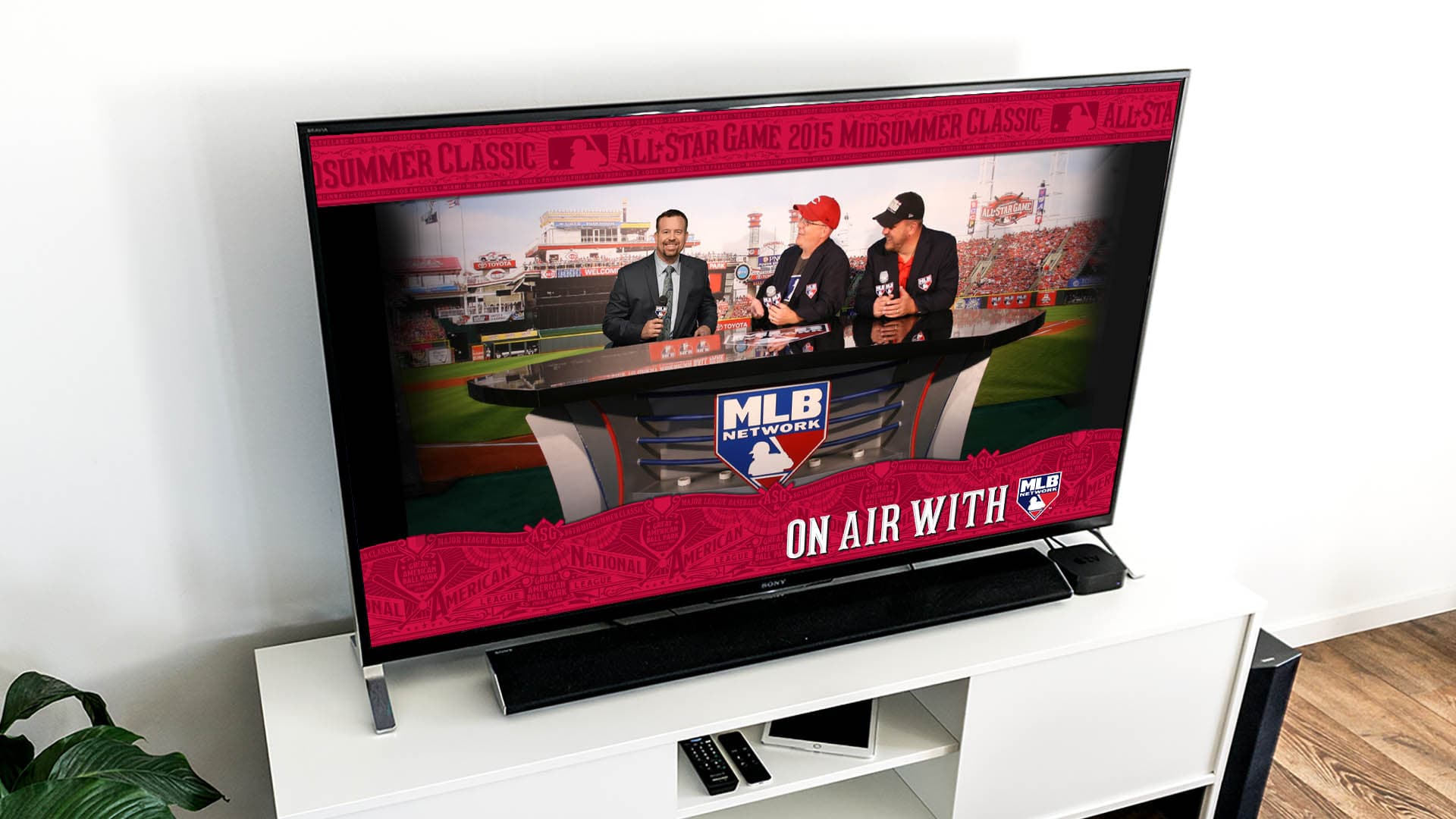 A photo mockup of guests and the booth on a TV