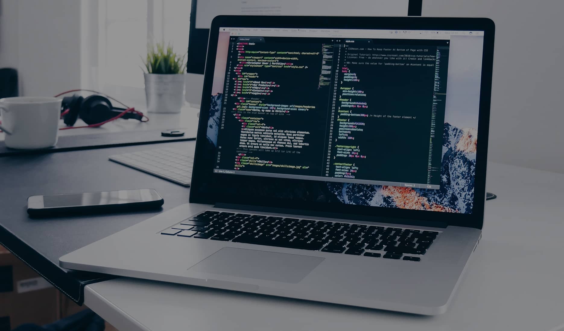A laptop displaying Microsoft Web Forms on a desk