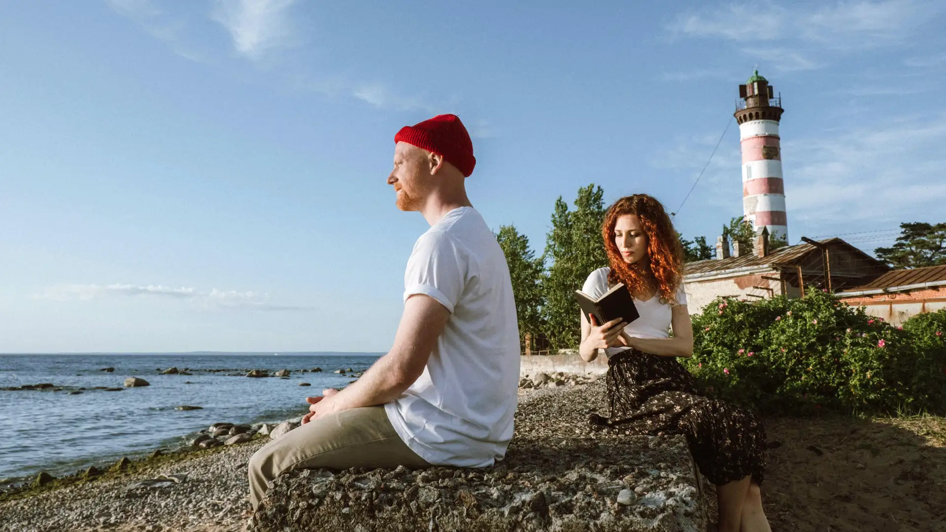 A couple relaxing by the sea