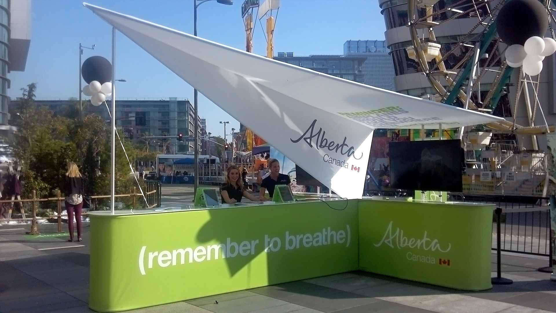 A kiosk with Travel Alberta branding